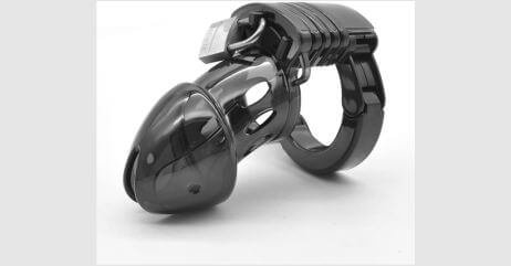 A femdom chastity cage on display