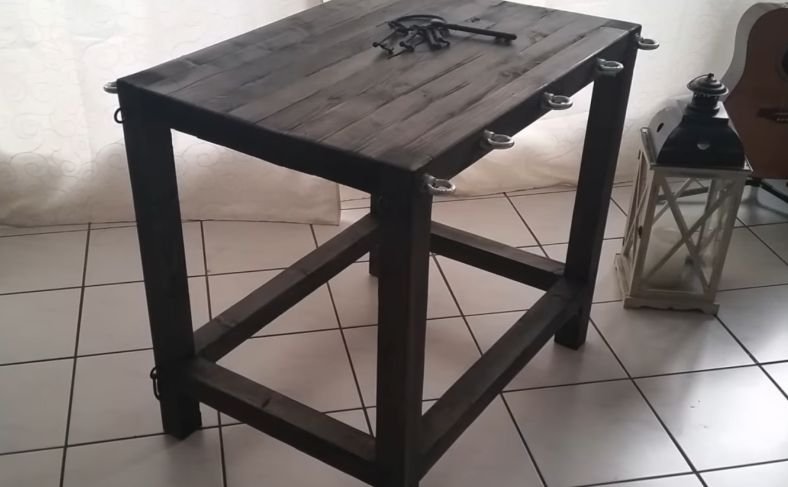 A wooden BDSM Bondage Table