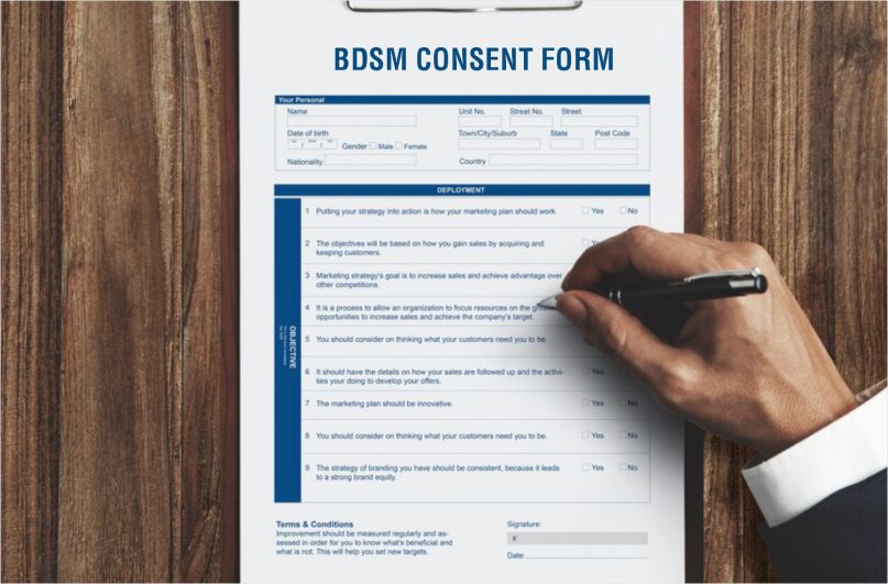 A man signing the BDSM consent form